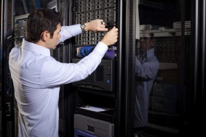 IT Technician Reparing Data Drives